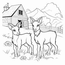goats in the field with barn